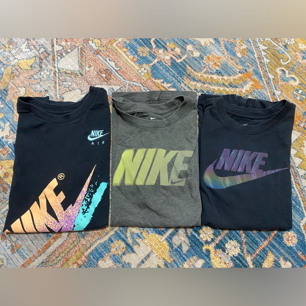 3 Nike tshirts.
